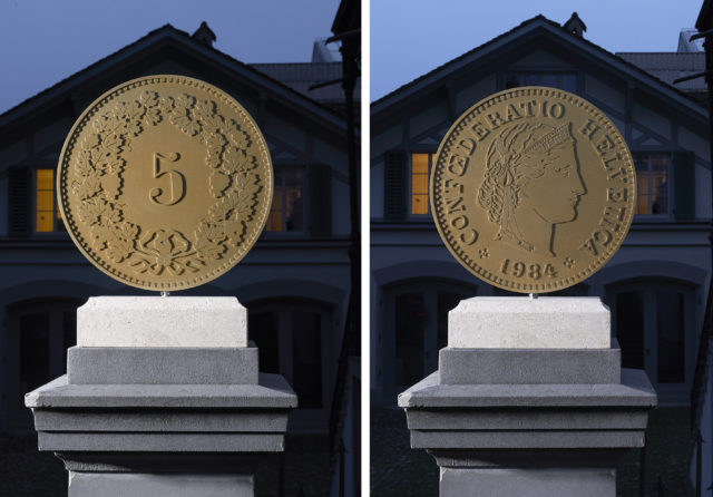 LIBERTAS LIBERTAS – Elena Montesinos - Two large tossing coins installed on Pro Helvetia's headquarters portal in Zurich